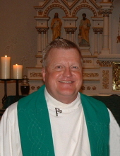 Father Mike Tauke